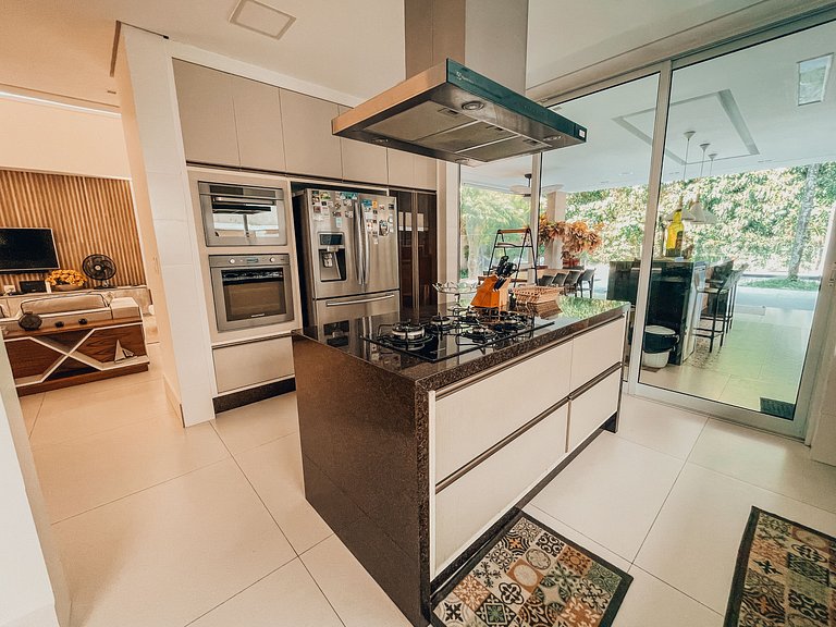 Casa 6225 - 5 suítes, piscina, sauna e translado para praia