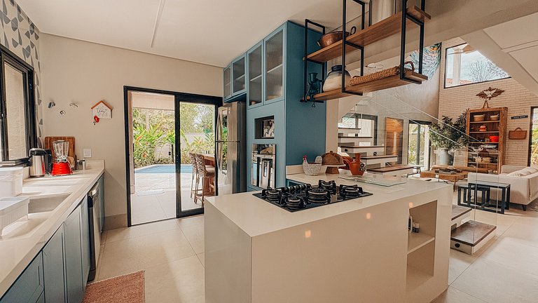 Casa 2426 - Sofisticação entre a natureza, com piscina aquec