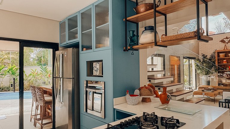 Casa 2426 - Sofisticação entre a natureza, com piscina aquec