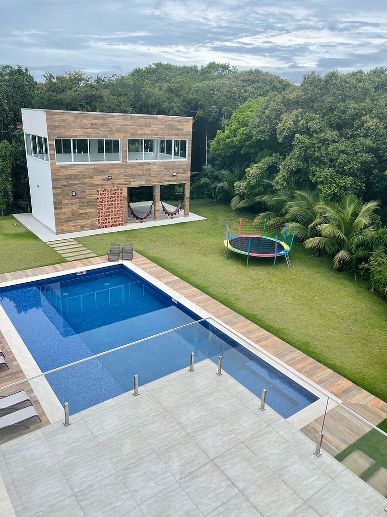 Casa 2627 | 8 suítes para até 32 pessoas na Praia de Guaratu